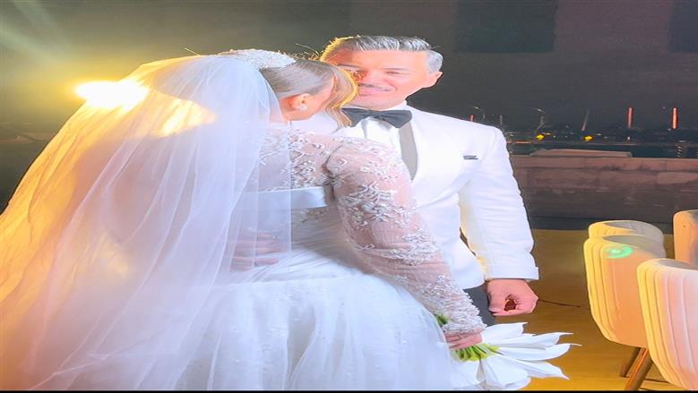 هايدي موسى وزوجها محمد غانم<br> 